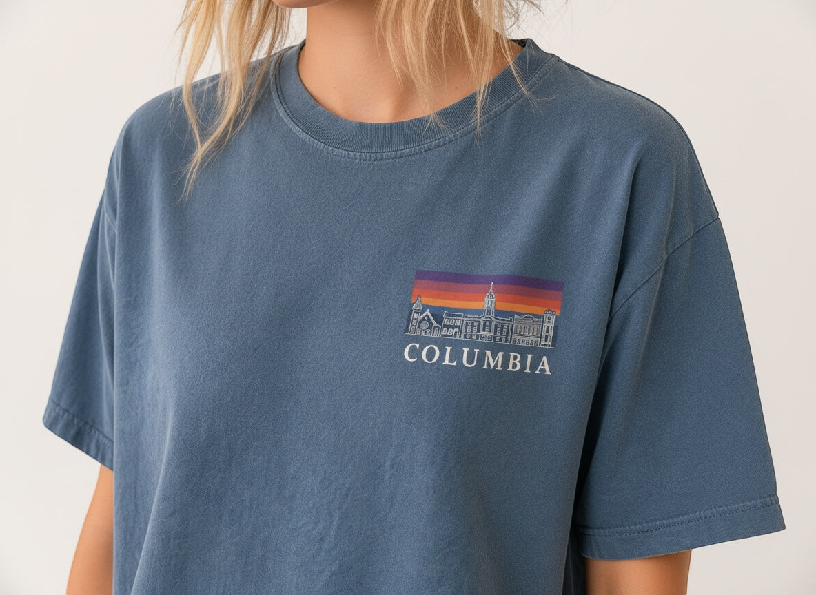 Press Society blue cotton t-shirt with a graphic print of Columbia University buildings at sunset.