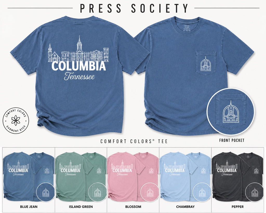 Press Society blue jean comfort dyed pocket t-shirt with Columbia Tennessee skyline graphic on back and pocket detail.