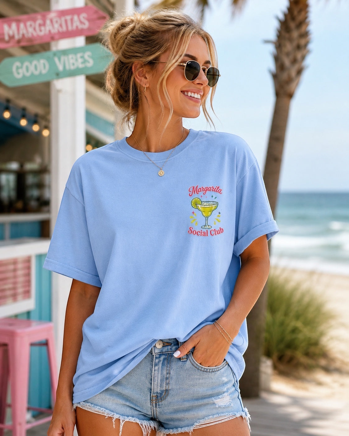Press Society light blue cotton t-shirt with a vintage margarita graphic and text 'Margarita Social Club'.